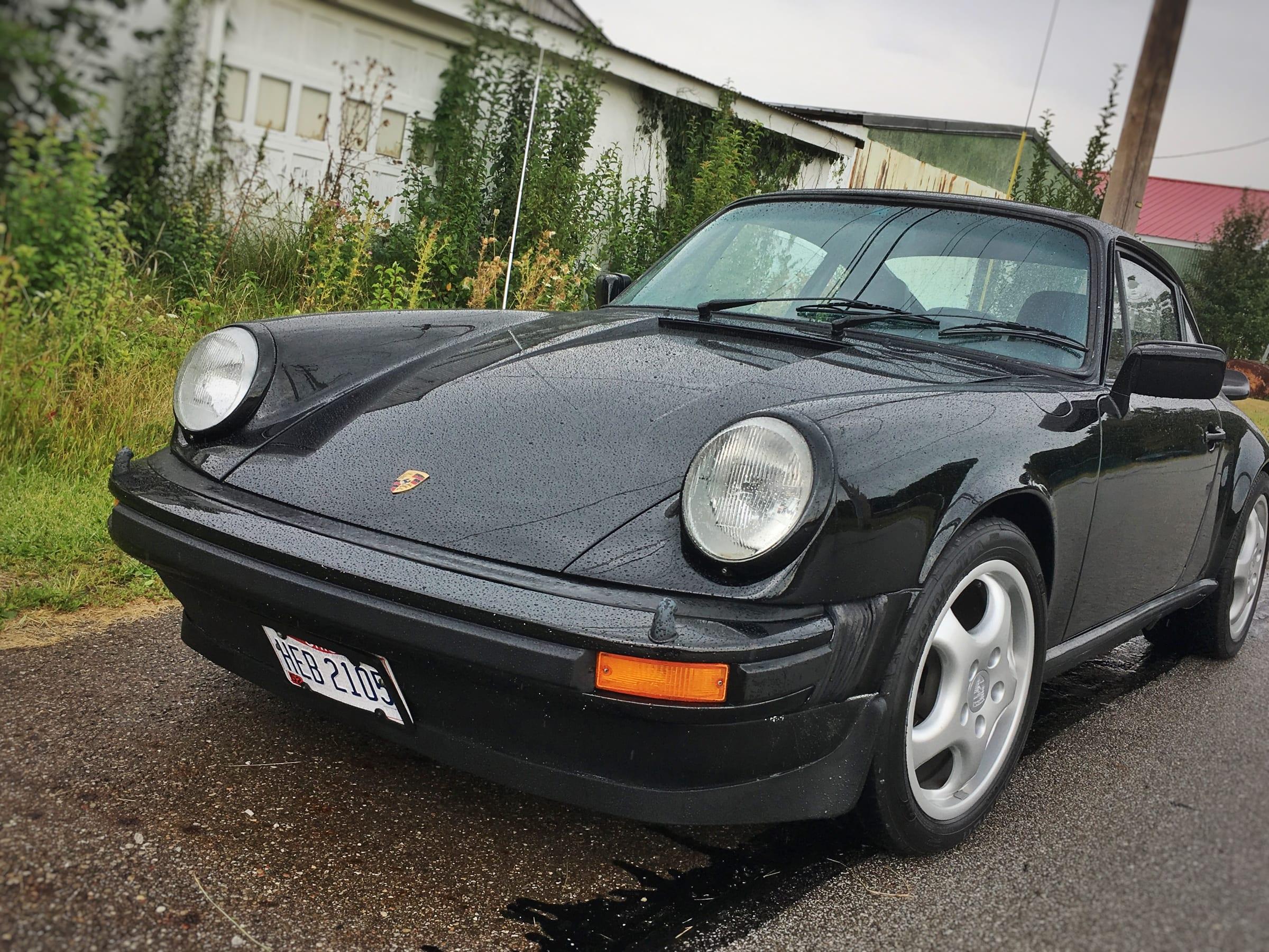 Black 1979 Porsche 911 with water beading on the paint